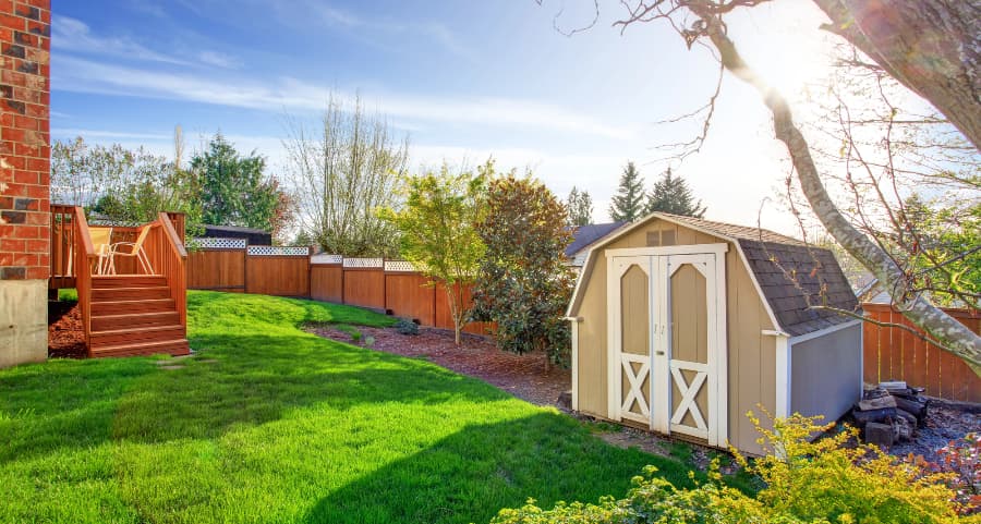 Fenced backyard with storage shed in Fort Lauderdale